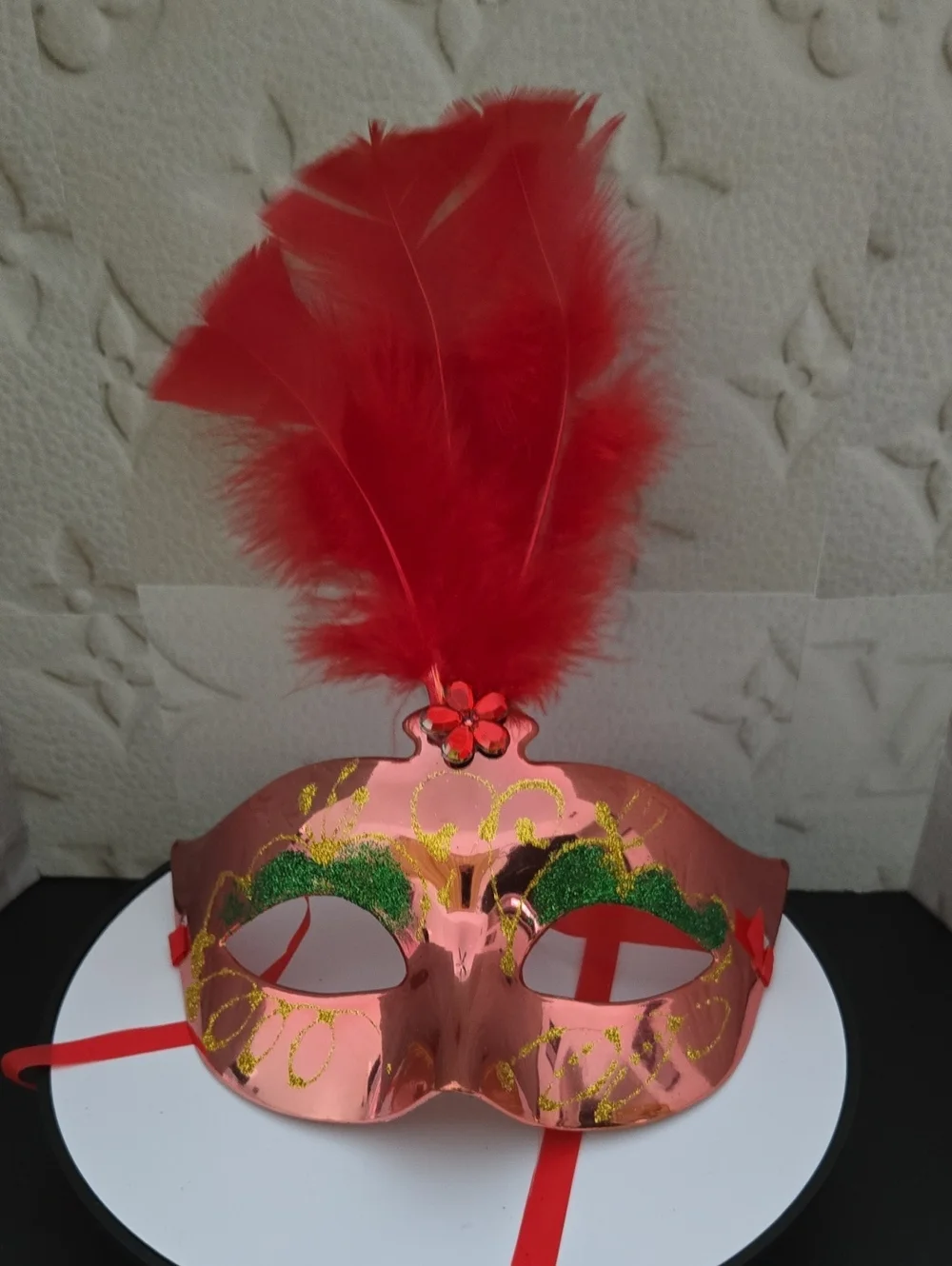 Red Feathered Masquerade Mask with Green Accents